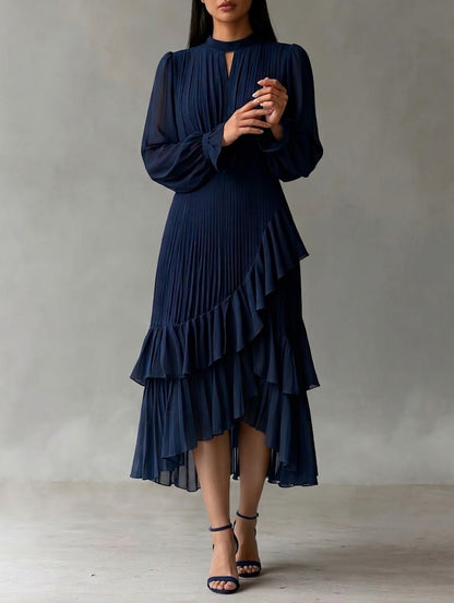 Vestido midi plisado elegante con volantes