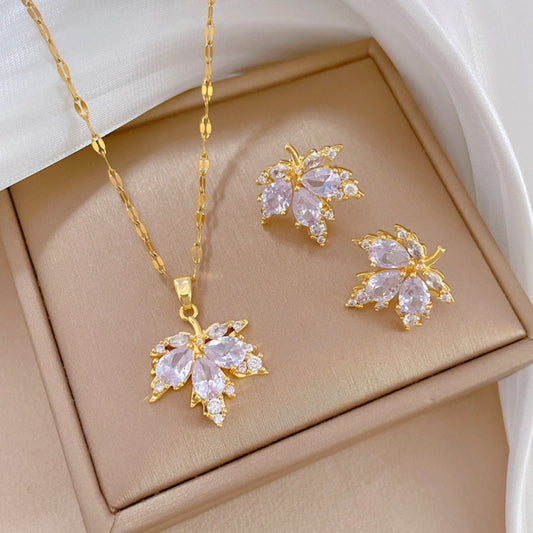 Alba Montiel™ | Pendientes de la suerte con hojas blancas y collar gratis