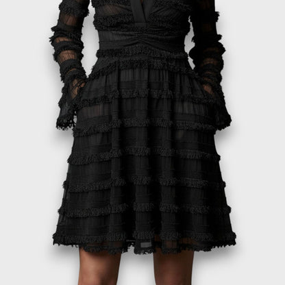 Parisa – Vestido midi con flecos transparentes ✨