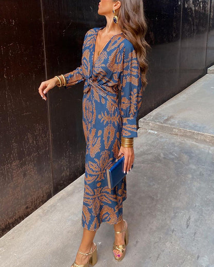 Izabella: un elegante vestido midi con un estampado original
