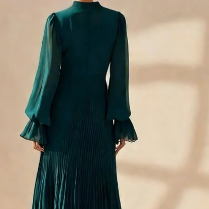 Vestido midi plisado elegante con volantes